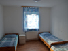 Schlafzimmer mit Einzelbetten - Unterkunft + Reiskirchen